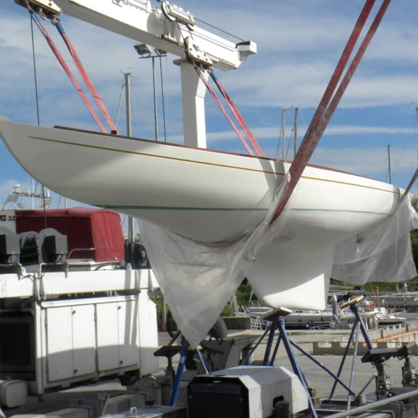 boat being lifted on a hoist