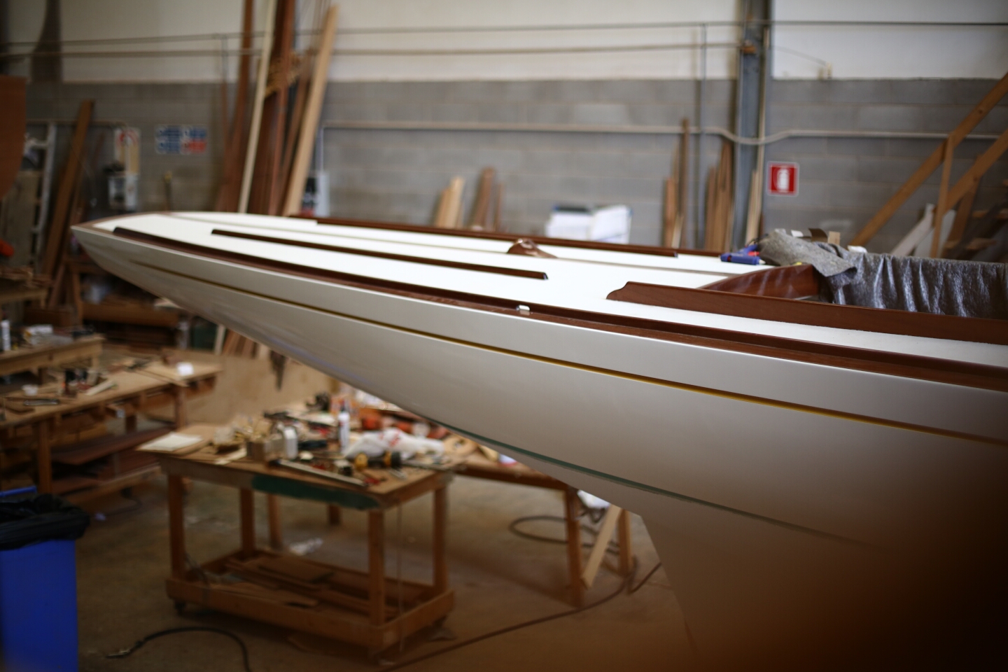 end of a boat in a workshop after restoration