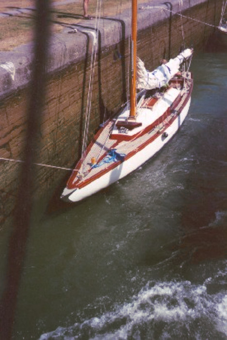 A yacht moored in a lock