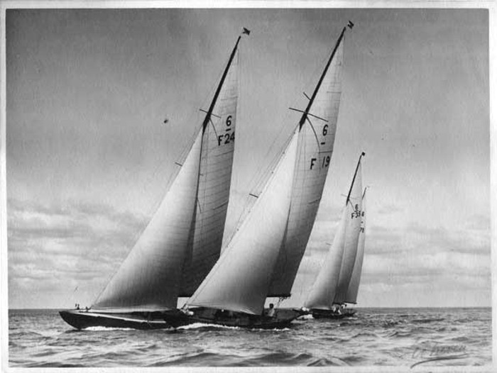 black and white photo of yachts sailing