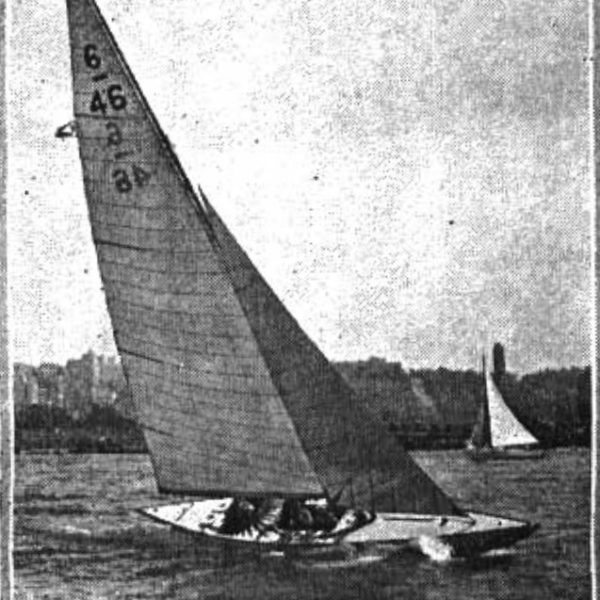 Historic black and white photo of a yacht.