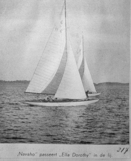 Black and white photo of two white yachts sailing